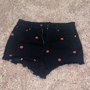 PINK shorts. Size 4. Black with pink roses.